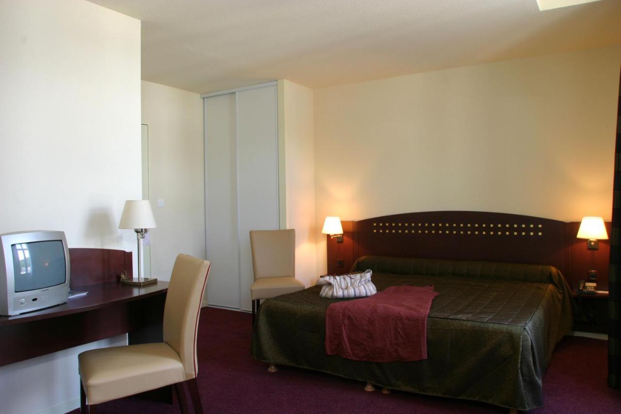 Le Parc Des Fees Hôtel Retaurant&Spa La Bourboule Quarto foto